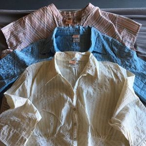 Three pearl snap shirts